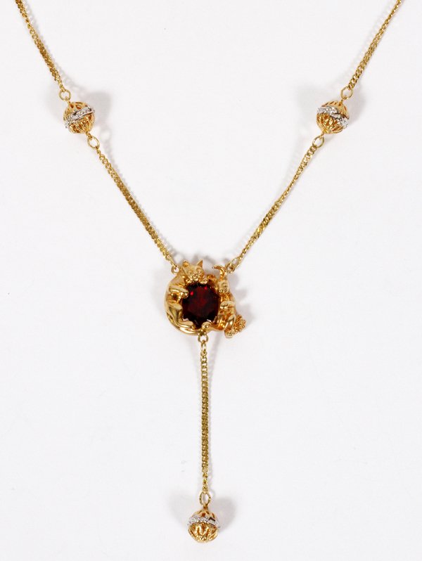 14KT YELLOW GOLD & GARNET NECKLACE/LAVALIERE: 14KT YELLOW GOLD & GARNET NECKLACE/LAVALIERE, L 16":With motif of kittens and three dangling balls enhancements. Weighs approximately 7 grams. Very pretty.