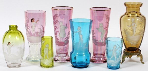 MARY GREGORY GLASS TABLEWARE LATE 19TH-20TH C.: MARY GREGORY GLASS TABLEWARE, LATE 19TH-20TH C., EIGHT PIECES, H 3 3/4"-7":Including a pair of pink glass vases at H. 7", together with one blue vase at H. 6", two yellow vases at H. 3 3/4" and H. 5 1
