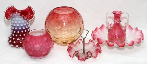 VICTORIAN CRANBERRY GLASS ROSE BOWLS & VASES: VICTORIAN CRANBERRY GLASS ROSE BOWLS & VASES, LATE 19TH C., SIX PIECES, H 6"-8":Including 1 cranberry opalescent hobnail vase, 2 rose bowls, 1 handled vase, and 2 ruffled bowls, one of which with a ce