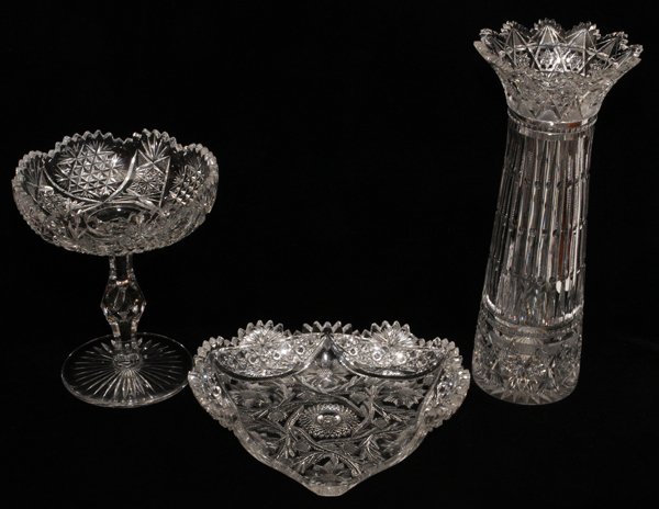 CUT GLASS COMPOTE HEART DISH & VASE EARLY 20TH C.: CUT GLASS COMPOTE, HEART DISH & VASE, EARLY 20TH C., H 13":Including 1 compote, H.8 1/2", 1 heart-form dish, W.10", and 1 vase, H.13". Three items total.