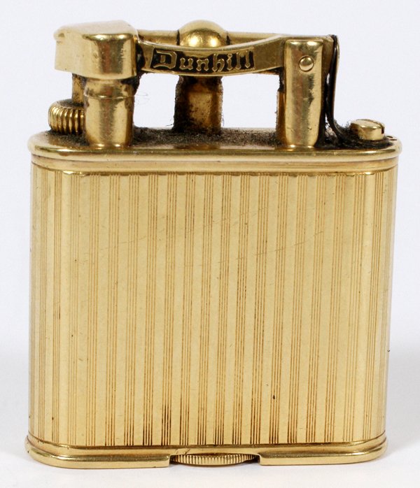 ALFRED DUNHILL 18KT YELLOW GOLD LIGHTER 20TH C.: ALFRED DUNHILL 18KT YELLOW GOLD LIGHTER, 20TH C., H 2" W 1 3/4":Stamped: Stamped: Alfred Dunhill, 18K, Paris at the underside. Measuring H. 2" x 1 3/4", having a total approximate weight of 72.1 grams