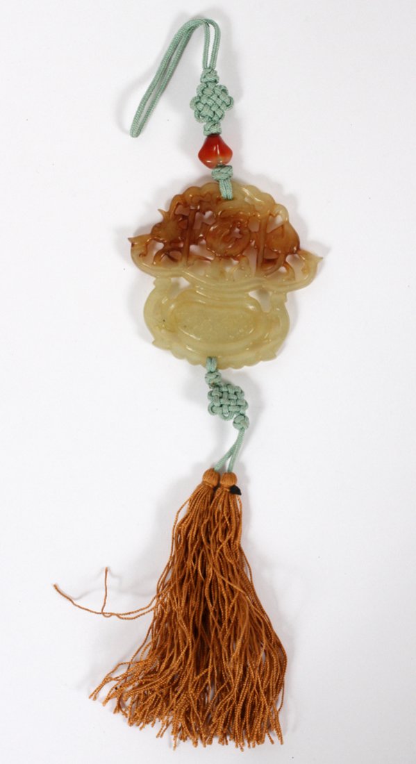 JADE PENDANT URN FORM W/ FLOWERS SILK TASSELS: JADE PENDANT, URN FORM WITH FLOWERS, SILK TASSELS, H 2":green to brown For a high resolution photo CLICK HERE