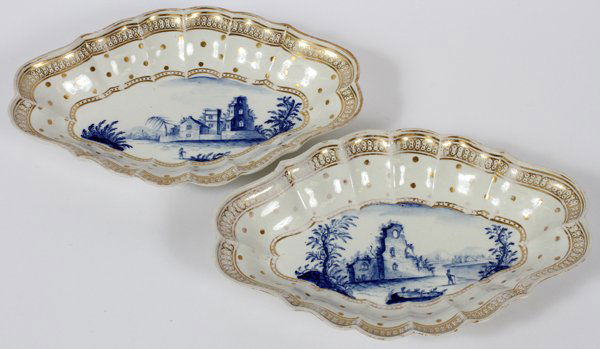 ENGLISH PORCELAIN DESSERT DISHES LATE 18TH C. PAIR: ENGLISH PORCELAIN DESSERT DISHES, LATE 18TH C., PAIR, L 10", PROBABLY CAUGHLEY:One depicting a man walking past a compound with stone fence and the other depicts a man walking past ruins. Measuring H.