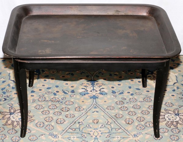 PAPIER MACHE TRAY TOP TABLE: PAPIER MACHE TRAY TOP TABLE, EARLY 19TH C., H 20", L 32 1/2" X 23 3/4":Rectangular papier mache tray with rounded corners, painted with a pastoral scene, raised on a painted black wood base of a later