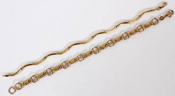 14KT YELLOW GOLD LINK BRACELETS TWO: 14KT YELLOW GOLD LINK BRACELETS, TWO, L 7":One is "wavy" and other is link. Totaling approximately 13 grams. For a high resolution photo CLICK HERE
