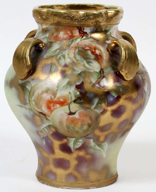 NIPPON HAND-PAINTED PORCELAIN VASE EARLY 20TH C.: NIPPON HAND-PAINTED PORCELAIN VASE, EARLY 20TH C., H 7 1/2" W 6":Baluster form vase, molded with fired gold handles about the shoulder, and decorated in fruit motif. Measuring H. 7 1/2" x 6". Early 20