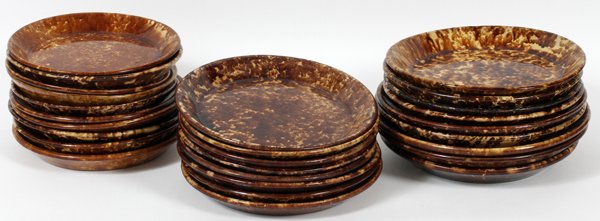 BENNINGTON POTTERY TABLEWARE 28 PIECES: BENNINGTON POTTERY TABLEWARE, 28 PIECES:Dia. 9"-11 1/4". 27 Plates and 1 bowl.