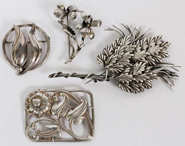 STERLING FLOWER BROOCHES FOUR-3: STERLING FLOWER BROOCHES, FOUR, W 1 1/2"-3":Sterling silver brooches include 1 by Coro, 1 stamped "Sterling", and 2 in the Danish style, one of which stamped "GK Co." and the other "Sterling". Four pi
