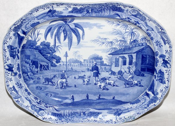 SPODE INDIAN SPORTING HISTORICAL BLUE PLATTER 1815: SPODE 'INDIAN SPORTING SERIES' HISTORICAL BLUE TRANSFER PLATTER, C. 1815, L 18":Earthenware platter from the Spode's "Indian Sporting Series", depicting a campsite with figures and hunting dogs, borde