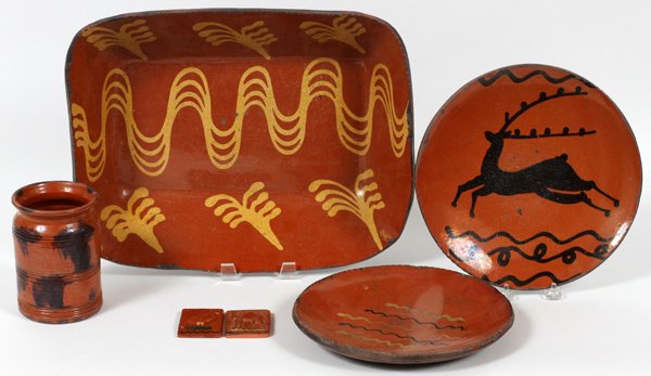 GREG SHOONER REDWARE POTTERY, C. 1994, SIX PIECES: GREG SHOONER REDWARE POTTERY, C. 1994, SIX PIECES: Including one rectangular serving dish, L 16" x 12", together with one vase, H. 5 1/2", two plates, Dia. 9 3/4"-10 1/2", and two plaques, L. 2" x 2 1
