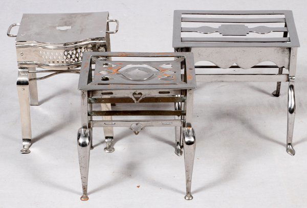 ENGLISH STEEL TRIVETS, THREE, H. 12": ENGLISH STEEL TRIVETS, THREE, H 12": Each measuring H. 12".