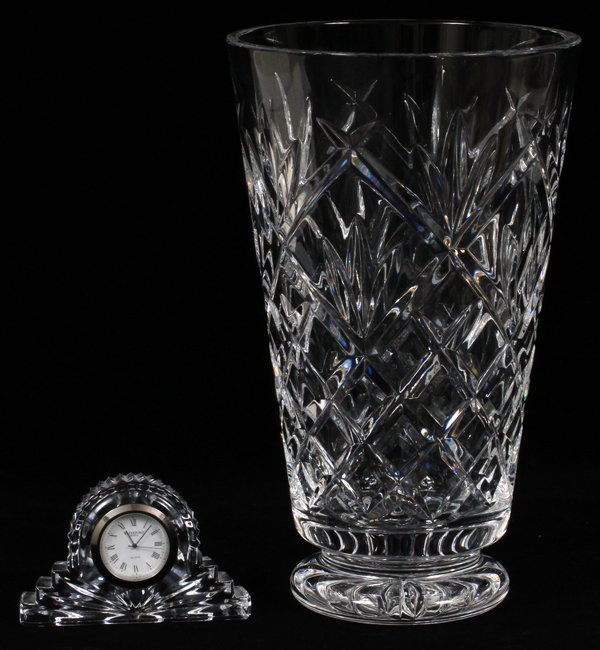 WATERFORD CRYSTAL BOUDOIR CLOCK & VASE: WATERFORD CRYSTAL BOUDOIR CLOCK & VASE, H 10":Including a Waterford vase H 10" and a Waterford crystal quartz movement clock H 2.5", L 4". Two items total.
