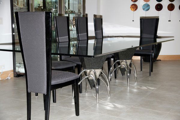 BRUETON ARROWHEAD GLASS TOP W/ TABLE BASE 10 CHAIRS: BRUETON ARROWHEAD GLASS TOP, WITH TABLE BASE, 10 CHAIRS:Glass top, H 29", L 130", W 48". Including 9 side chairs and 1 arm chair. The table base is designed by Stanley Jay Friedman.