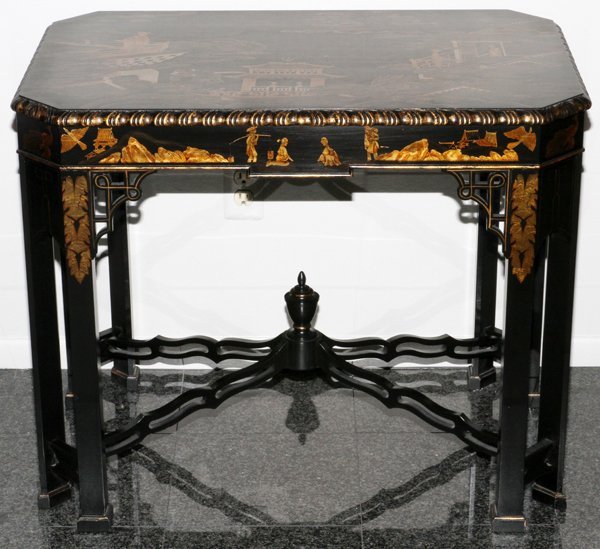 JOHN WIDDICOMB CHINOISERIE OCCASIONAL TABLE: JOHN WIDDICOMB CHINOISERIE OCCASIONAL TABLE, H 27", W 32", D 21":A black lacquer side table, fitted with two writing slides at either side, decorated with Oriental figure scenes in gold, raised on squ