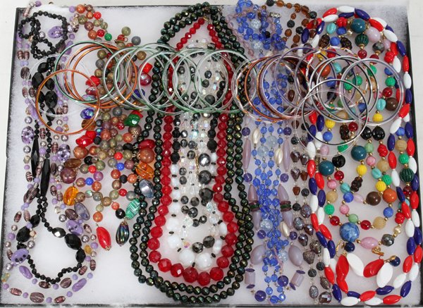 TRIFARI & OTHER COSTUME NECKLACES: TRIFARI & OTHER COSTUME NECKLACES (12), GLASS BANGLE BRACELETS (29), & PAIR OF EARCLIPS:Trifari includes 1 necklace with pendant fringe and a pair of red, white and blue earclips; together with 11 oth