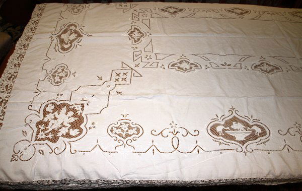 LINEN, LACE AND CUTWORK TABLE CLOTH 80" X 68": LINEN, LACE AND CUTWORK TABLE CLOTH 80" X 68":White. Hand made lace edge and inset panels with cherub design.