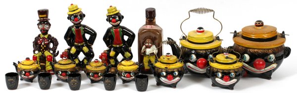 BLACK AMERICANA THAMES REDWARE TABLEWARE 17 PCS: BLACK AMERICANA THAMES REDWARE BLACK CLOWN TABLEWARE, 17 PCS, H 6"-8":Including one teapot, H 6", one cookie jar, H 7", one creamer, one covered sugar, two sets of salt and pepper shakers, one "Jungle