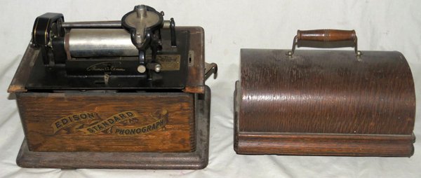 EDISON STANDARD PHONOGRAPH W/ LID C1910: EDISON STANDARD PHONOGRAPH WITH LID, C1910, H 11", W 11", D 9":Edison Standard Phonograph mounted in oak case with half round lid, with wire and wood handle. For a high resolution photo