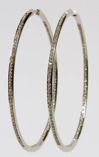 MIMI SO 18KT WHITE GOLD & DIAMOND EARRINGS PAIR: MIMI SO 18KT WHITE GOLD & DIAMOND EARRINGS, PAIR, L 2":Hoop style, set with enhancement diamonds. Stamped 750, 1445132 along with "Mimi So" (see additional photo). Totaling approximately 10 grams. For