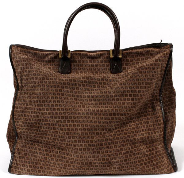 FENDI MONOGRAM SUEDE TRAVEL BAG: FENDI MONOGRAM SUEDE TRAVEL BAG, W 19":Monogrammed suede bag, with brown leather trim and handles, zippered top opens to a cloth lined interior; labeled: Fendi, Made in Italy. The bag measures H. 16"