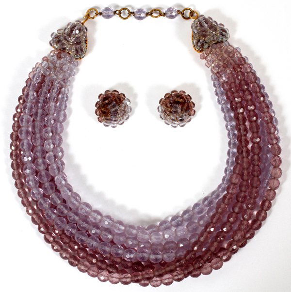 COPPOLA E TOPPO ALEXANDRITE NECKLACE & EARCLIPS: COPPOLA E TOPPO ALEXANDRITE GLASS MULTI-STRAND NECKLACE & PAIR OF EARCLIPS:Including 1 necklace comprising eight strands of light blue and lilac faceted glass beads of graduated size, L.15", with a pa
