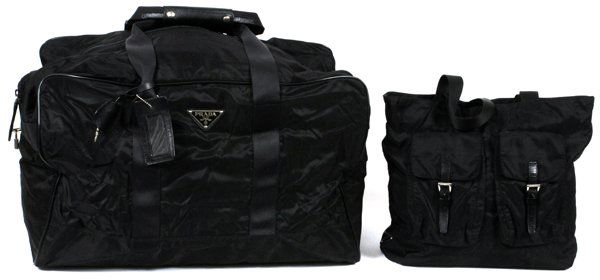 PRADA BLACK NYLON TOTE & DUFFEL BAG: PRADA BLACK NYLON TOTE & DUFFEL BAG, W 14" & 22":Including one black nylon tote bag, fitted with two exterior pouches, opens to a fabric lined interior, labeled: Prada, Milano, Made in Italy, H. 12" x