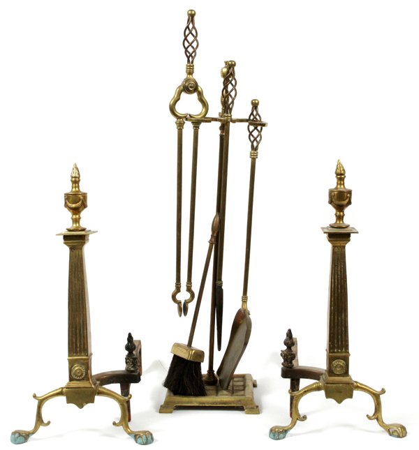 BRASS ANDIRONS C. 1800 PAIR & FIRE TOOLS: BRASS ANDIRONS, C. 1800, PAIR, & FIRE TOOLS:Brass antique andirons H 21", also fireplace tools in holder: shovel, tongs, poker. Circa 1920. For a high resolution photo
