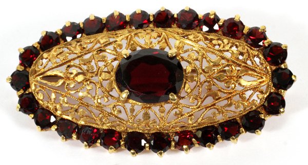 GARNET BROOCH BOHEMIA: GARNET BROOCH, BOHEMIA:Twenty seven garnets, probably set in gold plate. For a high resolution photo CLICK HERE