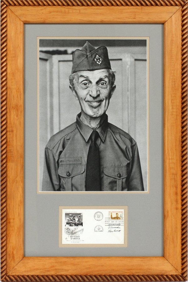 NORMAN ROCKWELL AUTOGRAPHED 1ST DAY COVER AND PRINT: NORMAN ROCKWELL AUTOGRAPHED 1ST DAY COVER AND PRINT, 1960, H 21", W 11", 50TH ANNIVERSARY OF THE BOY SCOUTS:depicts a print of a self portrait of Rockwell in a Boy Scout uniform along with an autograp