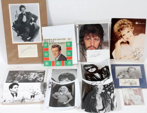 COLLECTION OF CELEBRITY SIGNATURES 12 PCS: COLLECTION OF CELEBRITY SIGNATURES, 12 PCS, LIBERACE, DAVID BOWIE, RINGO STARR:Signatures include: Ringo Starr, Bobby Darin, Barbara Streisand, Madonna, David Bowie, Kim Carnes, Brenda Lee, Roy Orbiso