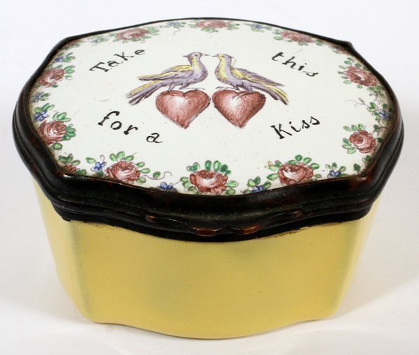 ENGLISH ENAMEL MOTTO BOX 19TH C.: ENGLISH ENAMEL MOTTO BOX, 19TH C., L 1 3/4":A hinged box decorated at the cover with lovebirds and motto "Take this for a Kiss", bordered with floral sprays, yellow base. Measures H.1 1/8" x 1 3/4" x 