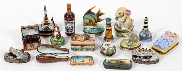 LIMOGES PORCELAIN DRESSER & PILL BOXES 17 PIECES: LIMOGES PORCELAIN DRESSER & PILL BOXES, 17 PIECES:Including three boxes with bunny figures, two Titanic ships, one with a fish, one lighthouse, and others. Grouping also includes one Russian lacquer b