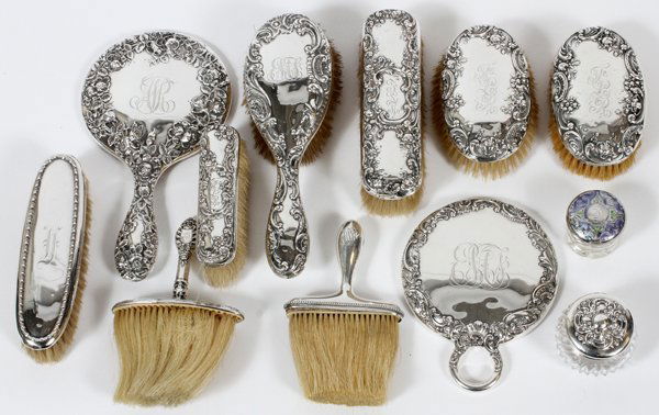 AMERICAN STERLING ASSEMBLED DRESSER ACCESSORIES: AMERICAN STERLING ASSEMBLED DRESSER ACCESSORIES, TWELVE PIECES:Including 2 hand mirrors, 1 hair brush, 5 clothes brushes, 2 whisk brushes, and 1 small jar with sterling silver cover, Dia.2", and 1 jar