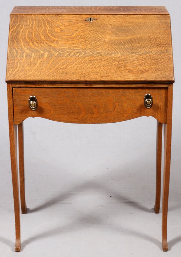 AMERICAN OAK SLANT-FRONT DESK C. 1900: AMERICAN OAK SLANT-FRONT DESK, C. 1900, H 38", W 26":Hinged slant front opens to envelope slots, a single drawer in the frieze. Measures H.38 1/2" x 26" x 16 1/2". For a high resolution photo