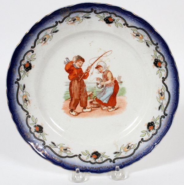 PFEIFFER BREWING DETROIT PORCELAIN PLATE: PFEIFFER BREWING DETROIT PORCELAIN PLATE, DIA 9":Collectors Plate, Dutch Boy and Girl Fishing, blue at edge with flowers. Marked on the underside Pfeiffer Brewing Co. Detroit and "Minton" stamped in g