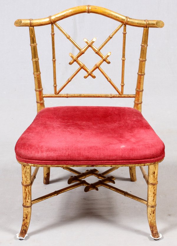 GILT WOOD SLIPPER CHAIR 19TH C.: GILT WOOD SLIPPER CHAIR, 19TH C., H 26":Gilt wood bamboo style frame with velvet upholstered seat. Measures H.26" x 20" x 16". For a high resolution photo CLICK H