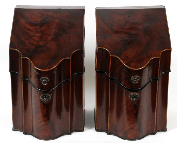 GEORGIAN MAHOGANY KNIFE URNS C. 1800 PAIR: GEORGIAN MAHOGANY KNIFE URNS, C. 1800, PAIR, H 14", W 9", D 11":Each has a slanted and hinged cover with inlay at the fitted interior (see additional photos). For a high resolution photo