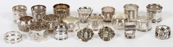 AMERICAN ENGLISH MEXICAN & OTHER NAPKIN RINGS: AMERICAN, ENGLISH, MEXICAN & OTHER STERLING NAPKIN RINGS, 20 PIECES:All are marked "Sterling" or with other marks, possibly Indonesian, except for three which are not marked. Late 19th-mid 20th centur
