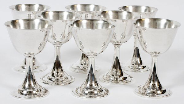 INTERNATIONAL 'LORD SAYBROOK' STERLING WINE GOBLETS: INTERNATIONAL 'LORD SAYBROOK' STERLING WINE GOBLETS, EIGHT, H 4 1/2":A set of 8 sterling silver wine goblets, lacking ornament, cups are connected base to stem, then stem to cup. Stamped underneath "I
