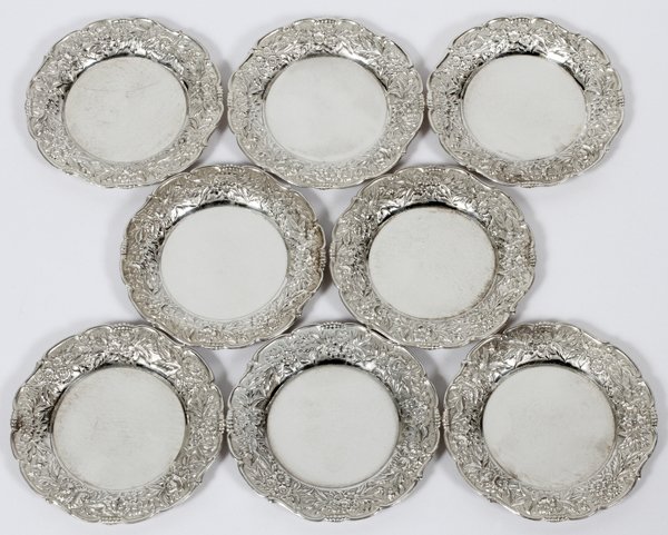 S. KIRK & SON STERLING BUTTER PATS, EIGHT: S. KIRK & SON STERLING BUTTER PATS, EIGHT, DIA 3 1/4":A set of 8 sterling silver butter pats, each with a floral repousse border; stamped manufacturer's markings along with number 17F (see additional 