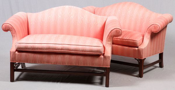 CHIPPENDALE STYLE MAHOGANY SETTEES, PAIR: CHIPPENDALE STYLE MAHOGANY SETTEES, PAIR, H 34'', L 57":Striped silk upholstered backs, scrolled arms and loose seat cushion, raised on rectilinear supports joined by stretchers.