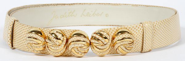 JUDITH LEIBER BEIGE KARUNG BELT W/ GOLD TONE BUCKLE: JUDITH LEIBER BEIGE KARUNG BELT WITH GOLD TONE BUCKLE:Beige karung snakeskin belt with gold tone ornament clasp, includes five orbs inlaid with matching karung. Adjustable size. Labeled: Judith Leiber
