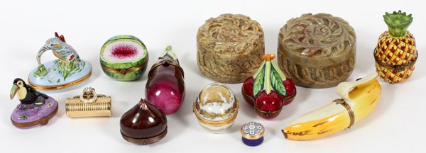 LIMOGES PORCELAIN & OTHER BOXES, THIRTEEN: LIMOGES PORCELAIN & OTHER BOXES, THIRTEEN, W 1"-5":Porcelain boxes include, by Rochard, 1 banana and 1 pineapple; 1 onion for Tiffany & Co.; and 6 others, including a toucan, eggplant, and trio of che