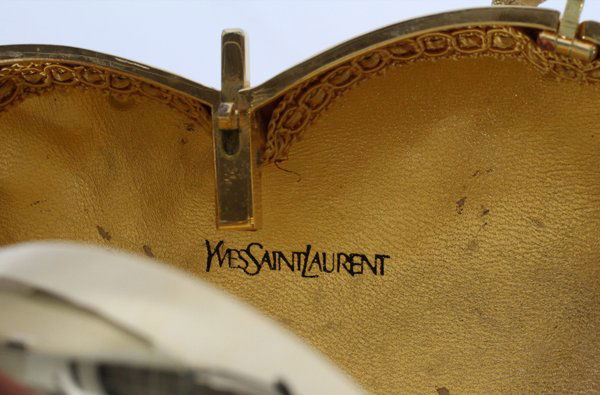 YVES SAINT LAURENT GOLD TONE HEART MINAUDIERE : Lot 111343  