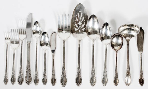 SILVER PLATE FLATWARE FOR 8 IN DUNCAN PHYFE STYLE: SILVER PLATE FLATWARE FOR 8 IN DUNCAN PHYFE STYLE TABLE:Enchantment pattern by 1881 Rogers Bros service for eight including serving pieces. All are housed in a Duncan Phyfe style mahogany cocktail tab