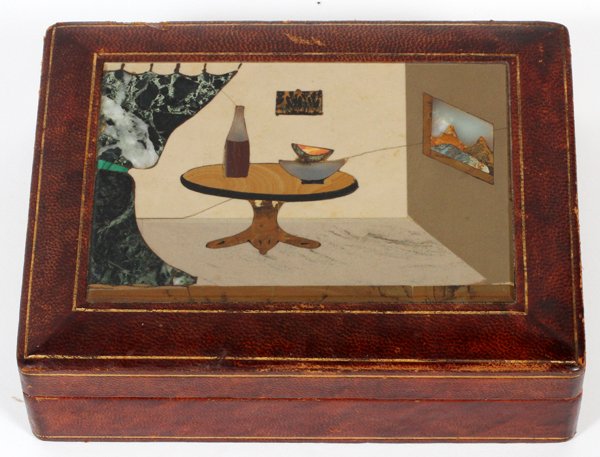 LEATHER & PIETRA DURA BOX: LEATHER & PIETRA DURA BOX, H 2", W 6 3/4":The leather box with pietra dura lid depicts an interior scene with table, wine bottle and picture on the wall. Measures H.2 1/4" x 6 3/4" x 5". For a high re