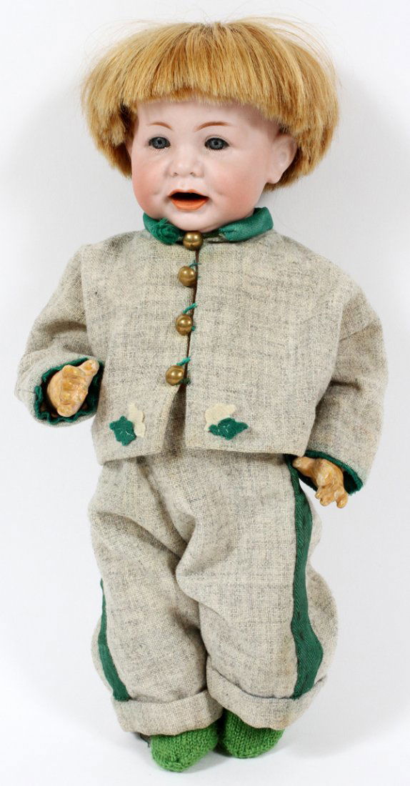 KAMMER & REINHARDT BISQUE HEAD CHARACTER DOLL: KAMMER & REINHARDT BISQUE HEAD CHARACTER DOLL, L 14":Bisque head with blue sleep eyes, open mouth with two teeth, incised at the back "K*R 116A" (see photo); composition jointed body. For a high resol