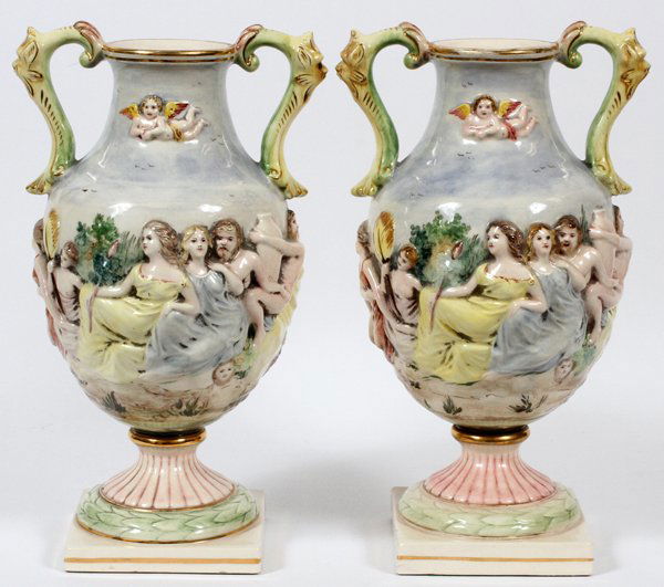 SACA, CAPODIMONTE POTTERY URNS C. 1930, PAIR: SACA, CAPODIMONTE POTTERY URNS, C. 1930, PAIR, H 15":"Italy, Saca" hand painted on underside. For a high resolution photo CLICK HERE