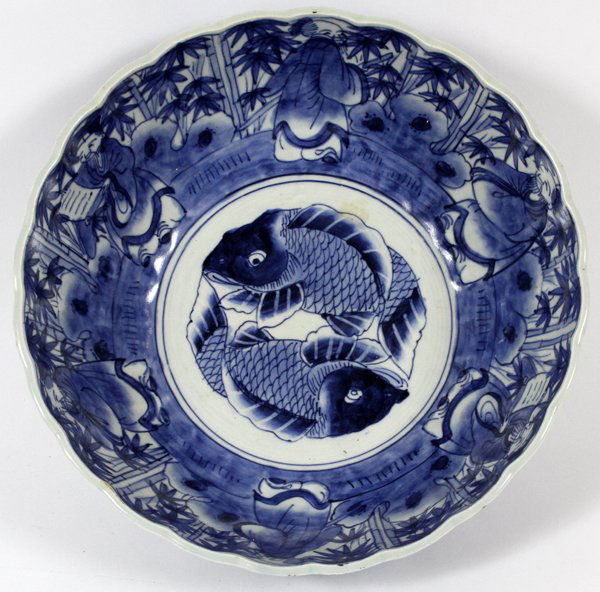 JAPANESE IMARI BLUE BOWL: JAPANESE IMARI BLUE BOWL, H 5", DIA 12":Carp at center, scallop edge, deep blue. Sages in border. For a high resolution photo CLICK HERE