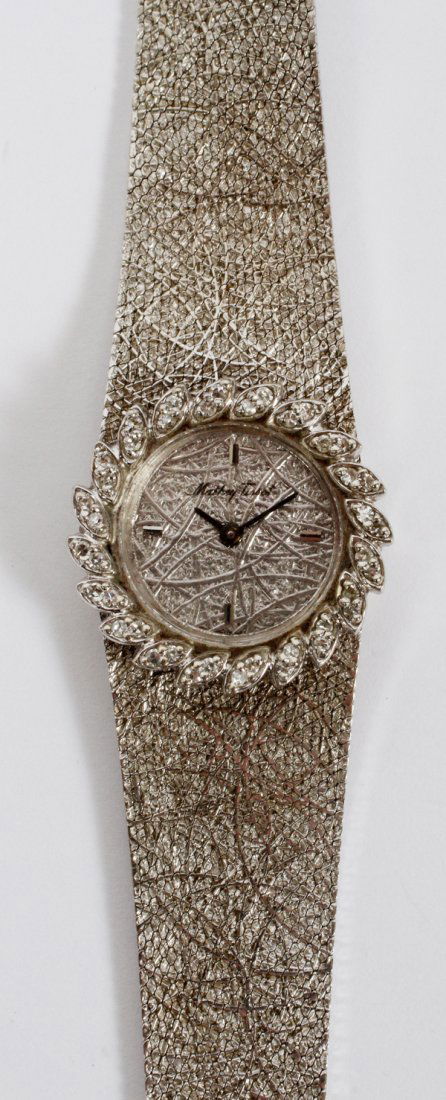 MATHEY TISSOT LADY'S 14KT. GOLD AND DIAMOND WATCH (1 of 3)